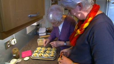 Two women baking