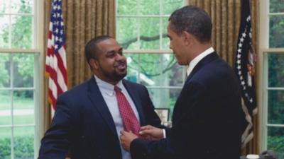 Joshua DuBois and President Obama in the Oval Office