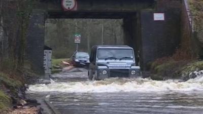 4x4 driving through flood water