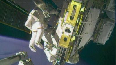 Astronauts Rick Mastracchio and Mike Hopkins on spacewalk outside the ISS