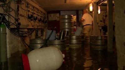 Inside flooded pub