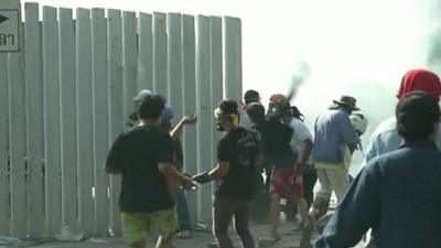 Anti-government protesters throwing rocks