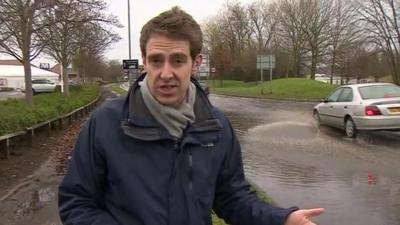 Nick Beake by flooded road in Byfleet