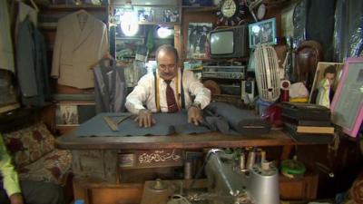 Abbas al Azzawi in his shop