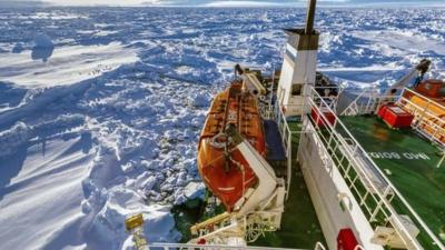 The boat trapped in the ice