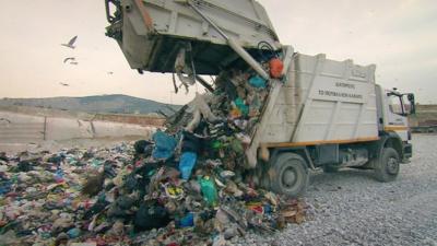 Rubbish being dumped at a landfill site