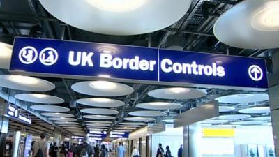 UK Border Controls sign at Heathrow Terminal Five