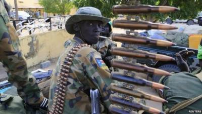 South Sudan army soldier with a machine gun