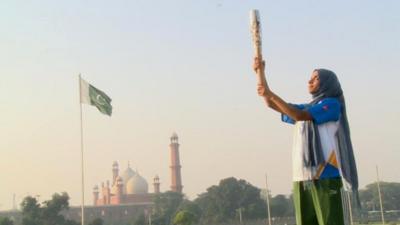 A woman holds the baton in Pakistan