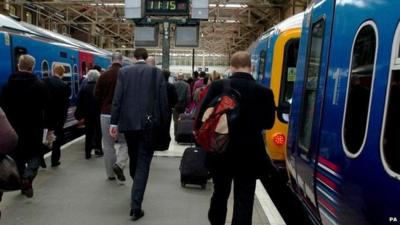 Rail commuters in King's Cross station