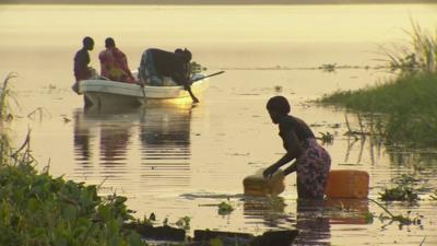 People gathering water from the Nile