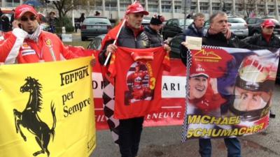 Schumacher fans with banners (3 Jan 2014)