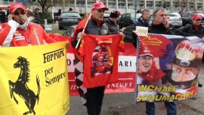 Schumacher fans with banners (3 Jan 2014)