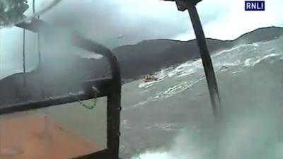 The lifeboats were launched in stormy weather on Friday morning