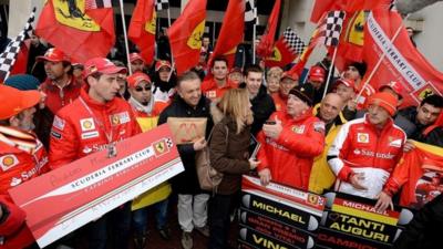 Ferrari fans outside the hospital where Michael Schumacher is being treated