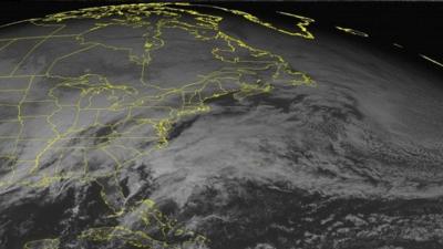 This NOAA satellite image taken Sunday, January 05, 2014 at 01:45 PM EST shows widespread clouds affecting the eastern United States as moisture was surging north ahead of developing low pressure in the Ohio Valley