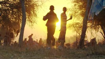 Children silhouetted in the Sun in South Sudan