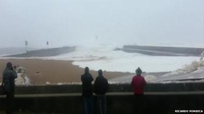 Portugal storm 'surge' wave destroys cars