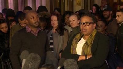 Mark Duggan's family and legal representation outside the Royal Courts of Justice