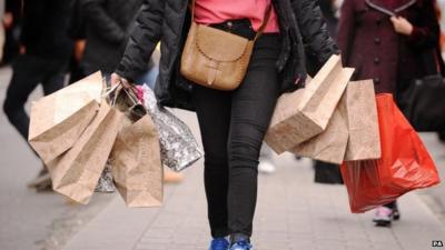 Woman carrying shopping bags