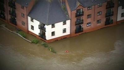 Houses surrounded by water