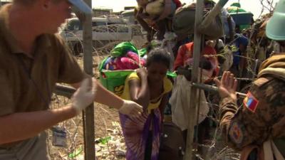 Fleeing Bentiu residents enter a UN compound