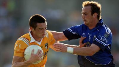 Niall McKeever in action for Antrim against Cavan in 2009