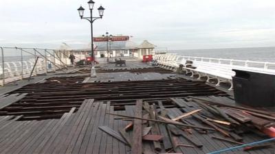 Storm surge damage on Cromer Pier