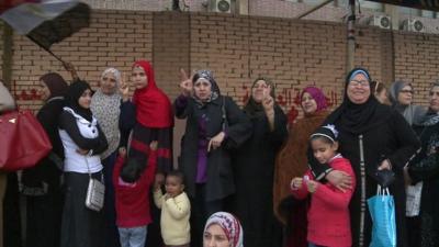 A queue of women waiting to vote