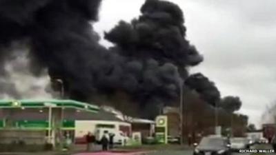 Smoke billows from the scene of the blaze in Buckinghamshire