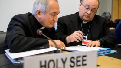 Silvano Tomasi (L) speaks with Former Vatican Chief Prosecutor of Clerical Sexual Abuse Charles Scicluna