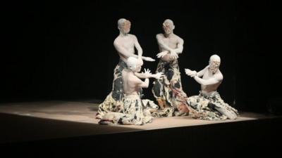 Theatre actors performing on stage in India