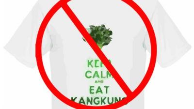 A t-shirt saying keep calm and eat Kangkung, with a not allowed sign over it.