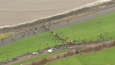 Aerial view shows search party