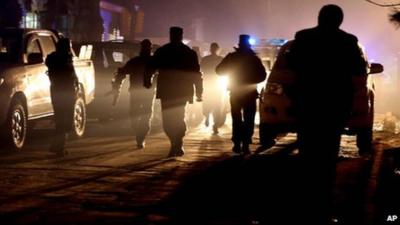 Afghan security forces at site of explosion in Kabul on 17 January 2014