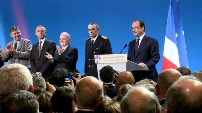 President Hollande (far right) in Tulle