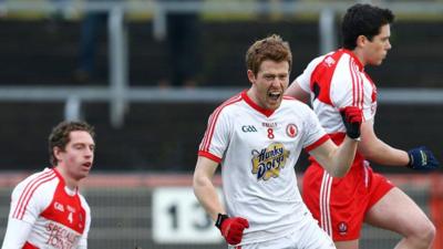 Niall McKenna celebrates his early goal against Derry