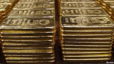 Piles of solid gold bars