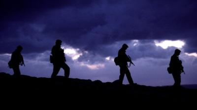 Silhouette of Falklands Islands Defence Force soldiers