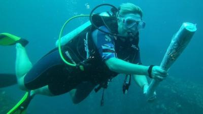 Queen's Baton Relay goes underwater in the Seychelles