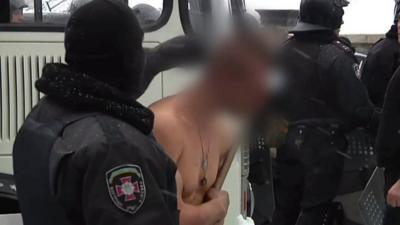 Protesters stripped and beaten in -10c