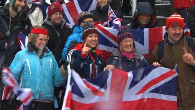 Great Britain's Lizzy Yarnold celebrates winning the World skeleton title