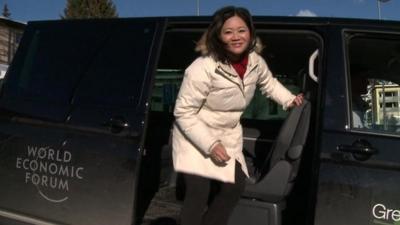 Linda Yueh and shuttle bus in Davos