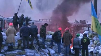 Picture from Ukrainian TV showing protesters behind barricades