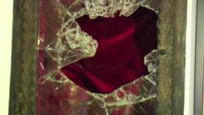 Broken glass at the chapel