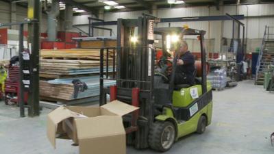 Man driving a forklift truck