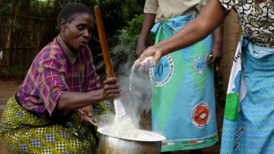 Women in Malawi prepare lunch