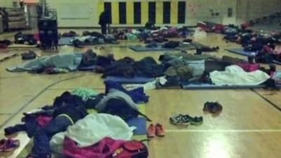 Children sleeping in their school gym, Atlanta