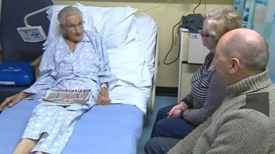 Patient Walter Church with his family in hospital