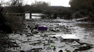 Debris washed up by flood water is seen at James Winslade's farm in Moorland on January 28, 2014 in Somerset, England